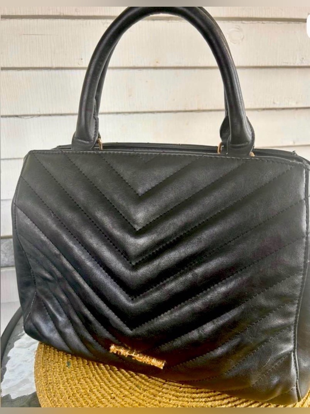 BETSEY JOHNSON, QUILTED BLACK LEATHER, CHEVRON/BOW BAG.